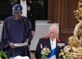 Tinubu eating cake in London, ADC blasts president as terror deaths surge
