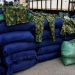 Police intercept diesel truck loaded with military camouflage, drugs in Lagos