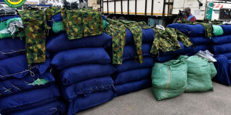 Police intercept diesel truck loaded with military camouflage, drugs in Lagos