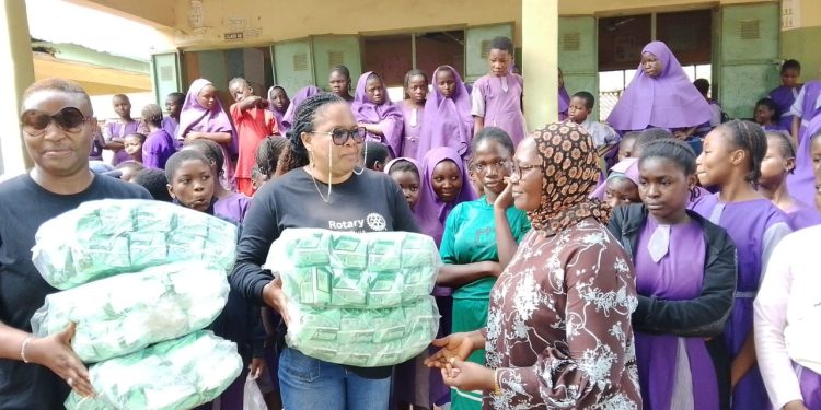 Rotary Club Gwarimpa commissions soak-away, plants trees, donates sanitary pads