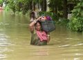 Over 100 reported dead in India floods